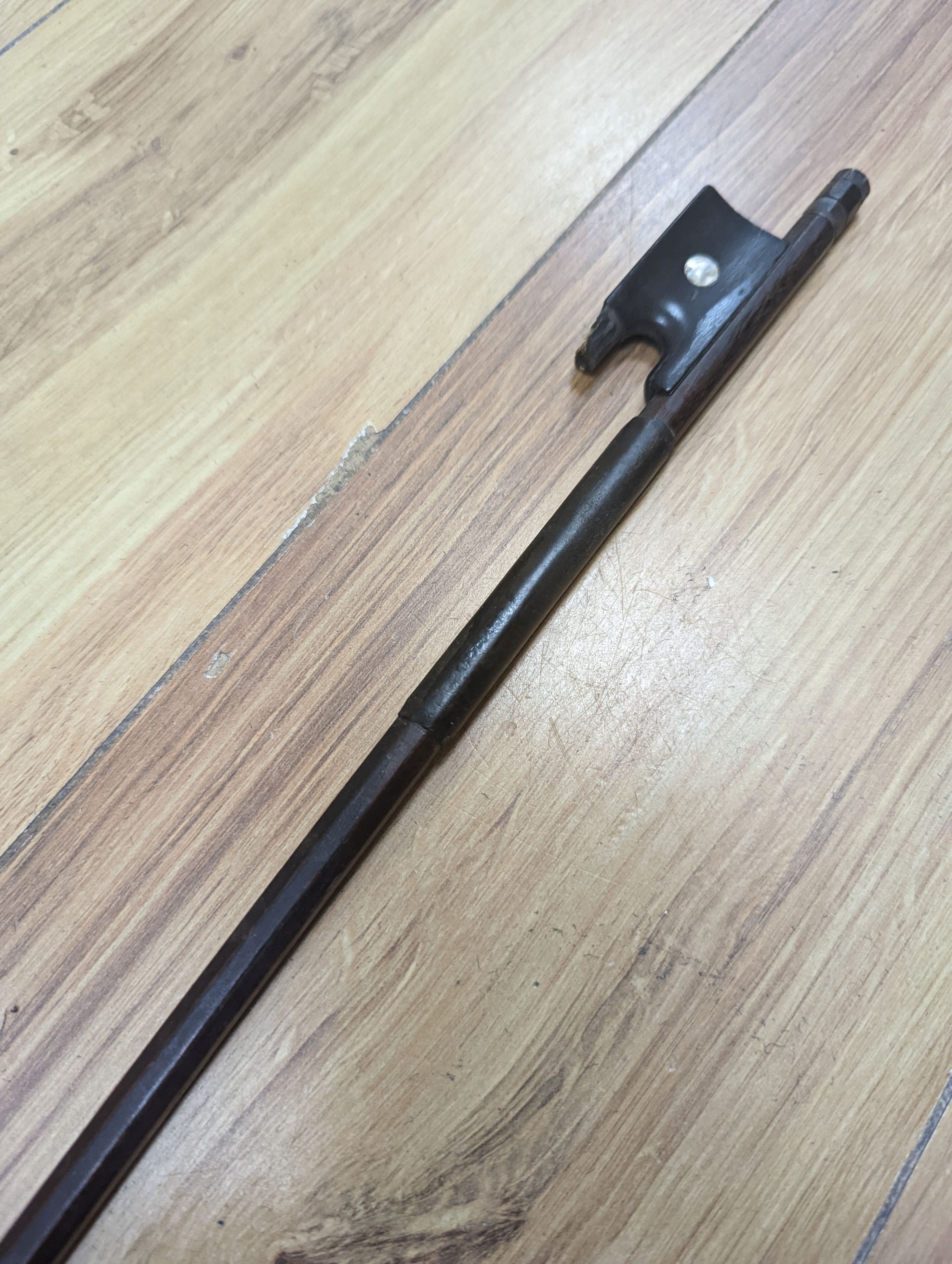 A violin and bow, various records etc